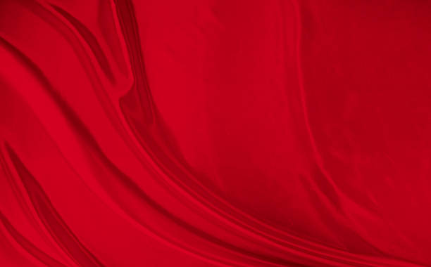 istock Black red satin dark fabric texture luxurious shiny that is abstract silk cloth background with patterns soft waves blur beautiful. 2239342252