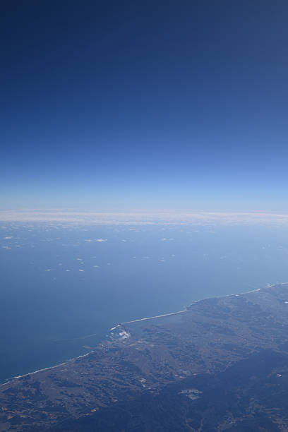istock View of cloud, sea and sky from Airplane 2239344853