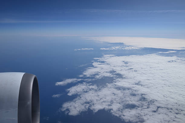 istock View of cloud, sea and sky from Airplane 2239344928