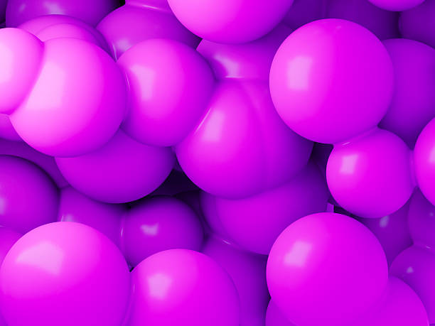 istock Abstract 3D glossy purple spheres background 2239345863