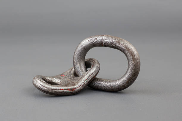 Close up of lifting bracket kit or shackel isolated on grey background. Rigging tool