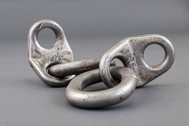 Close up of lifting bracket kit or shackel isolated on grey background. Rigging tool