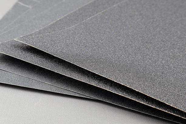 istock Close up sandpaper isolated on grey background. 2239351600