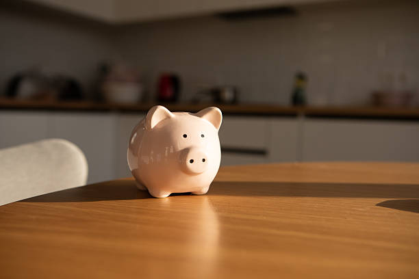 istock the piggy bank on the table 2239353521