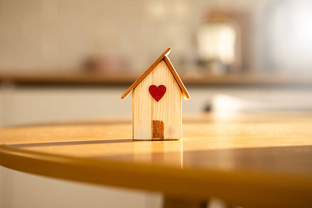 istock wooden house model on the table 2239353535