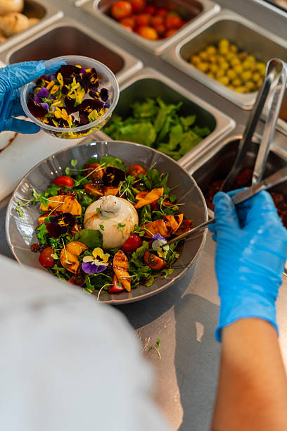Chef prepares a delicious Italian burrata in the restaurant's kitchen
