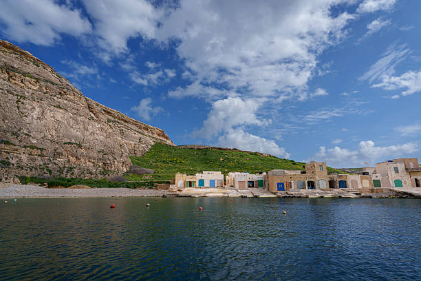 Rural Coastal Landscape with Traditional Stone Buildings in Malta
