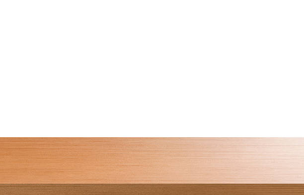 istock Front view of empty wooden table on white background. 2239368161
