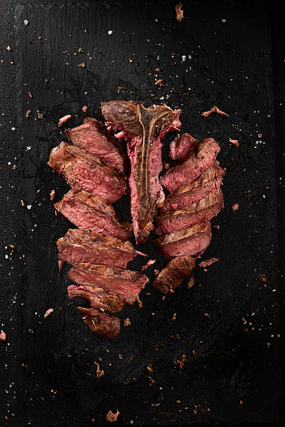 istock Beautiful Sliced Medium Rare T-Bone Steak 2239369967