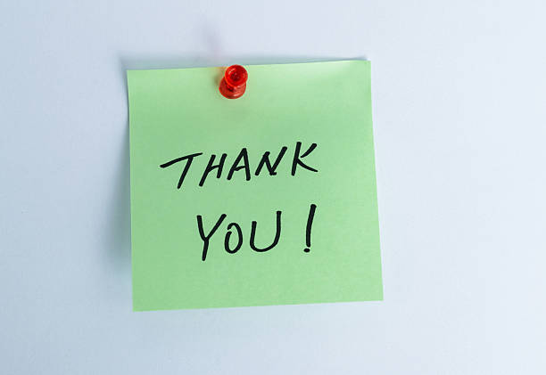 istock Thank you message on sticker note pin on white background 2239372791
