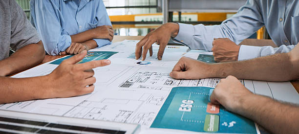istock Engineer team brainstorm meeting in factory office, discuss ESG project planning. Solar panel electrical power generation, environmental sustainable energy, Industrial business concept. Close up 2239397264