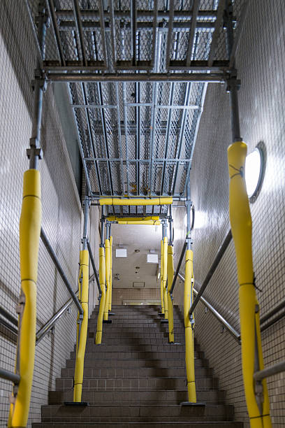 istock Staircase Under Maintenance with Yellow Safety Covers 2239400476