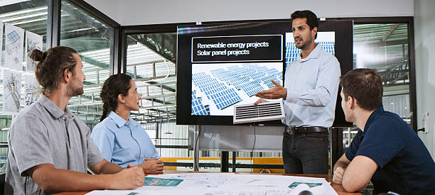 istock Engineer team brainstorm meeting in factory office. Presentation on ESG project planning. Solar panel electrical power generation, environmental sustainable energy. Industrial business concept 2239401366