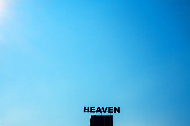 istock Minimal rooftop sign Heaven under clear blue sky with gentle sunlight and calm open space 2239401967