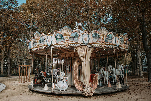 istock A carousel in a park in autumn 2239410221