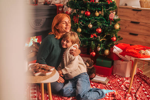 istock Mother and son embracing during christmas holiday 2239411666