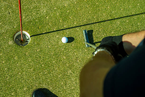 istock Golfer Selecting a Club from His Bag on the Course 2239413281