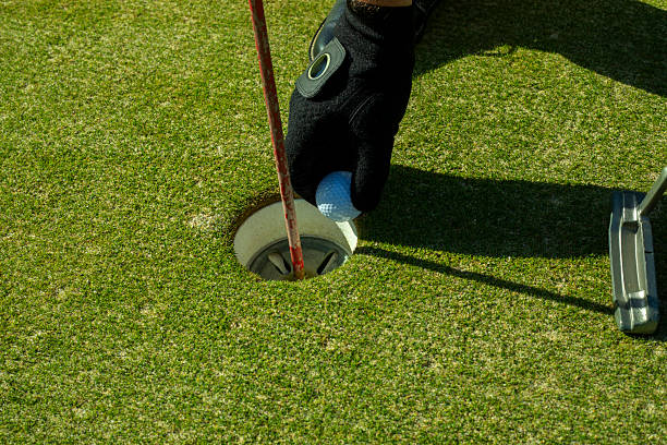 istock Golfer Selecting a Club from His Bag on the Course 2239413469