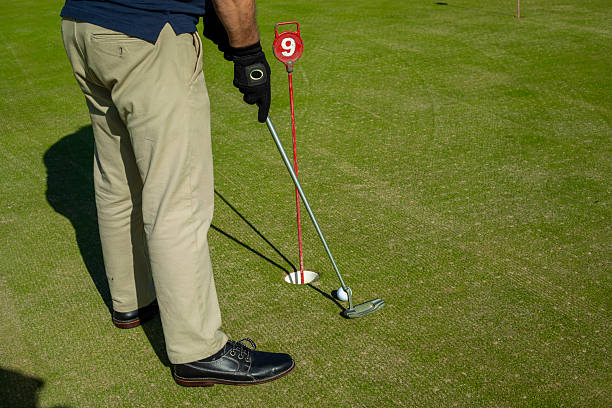 istock Golfer Selecting a Club from His Bag on the Course 2239413765