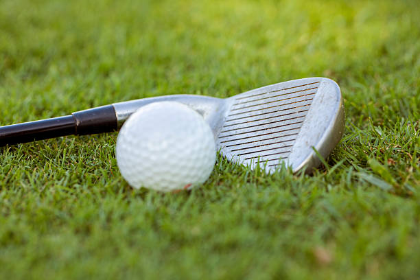 golf course, details of the golf ball and club
