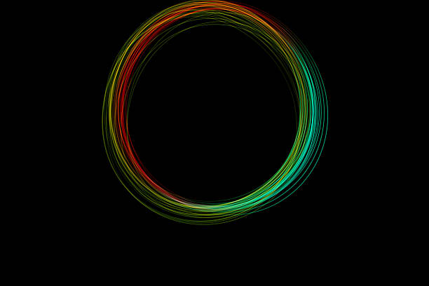 istock A vibrant circle of light forms through freeze light technique, showcasing colors against a dark background in a creative display 2239418646