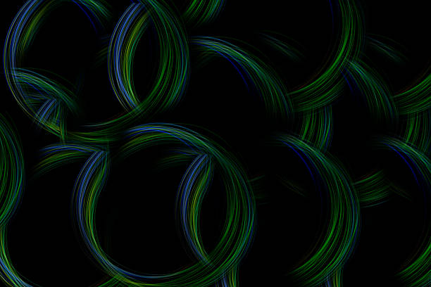 Vibrant and dynamic circles of light swirl in various shades against a dark backdrop, creating an enchanting nighttime scene.