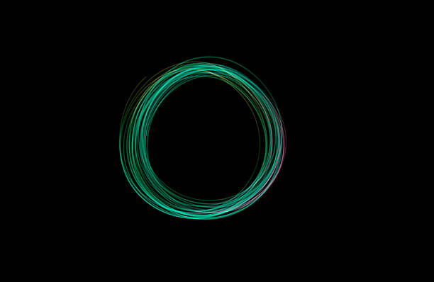 istock A vibrant green circular light is formed in a dark environment using freeze light technique, showcasing creative illumination 2239418705