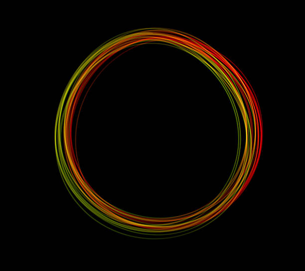 Brightly colored circle formed by freeze light technique against a dark background showcasing vibrant hues and smooth curves.