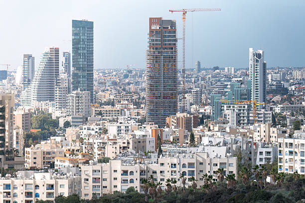 istock Construction site with crane building modern skyscraper in Limassol city Cyprus 2239426259