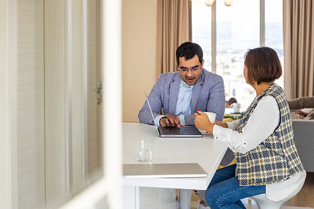 istock Woman consulting a financial advisor 2239428670