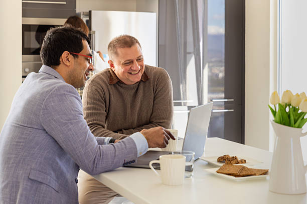 istock Meeting a financial advisor at home 2239429915