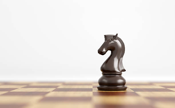istock Chess pieces in chess board games 2239431188