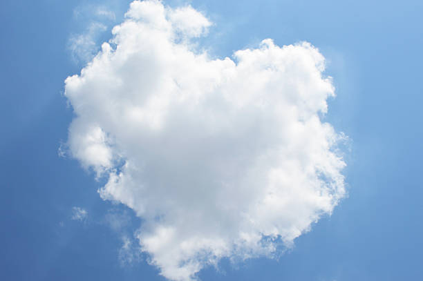 istock A beautiful white heart-shaped cloud, backlit by the sun 2239431204