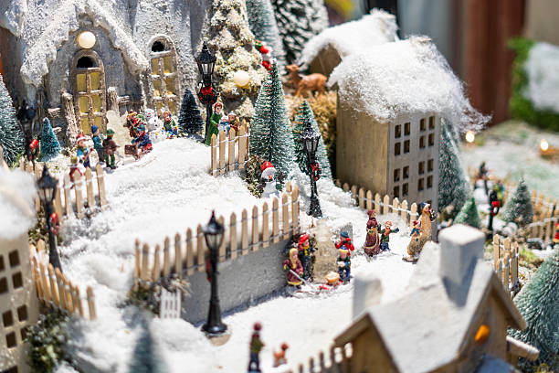 istock Miniature snowy Christmas village scene 2239431350