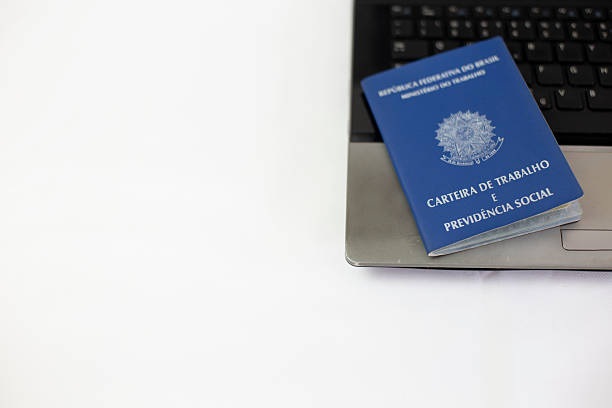 istock Brazilian work card with laptop in white background 2239439966