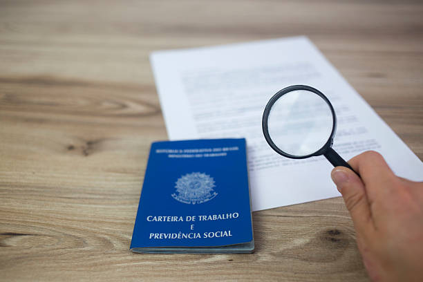 istock Brazilian work card with document and magnifying glass 2239439967