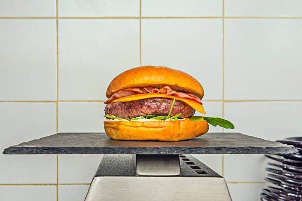A hamburger is a sandwich that usually contains minced meat or plant-based meat, joined together in the form of a grilled or pan-fried steak