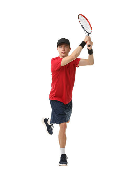 Man with tennis racket on white background