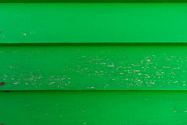 Rustic wooden slats painted green.