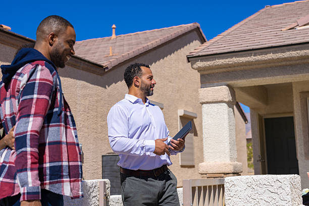 istock House viewing with real estate agent 2239451240