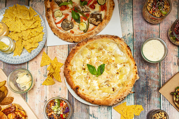 istock composition at sight hero with pizzas, noodles, nachos and sauces 2239455703