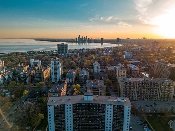 istock Cityscape at Sunset with Waterfront Skyline 2239460623