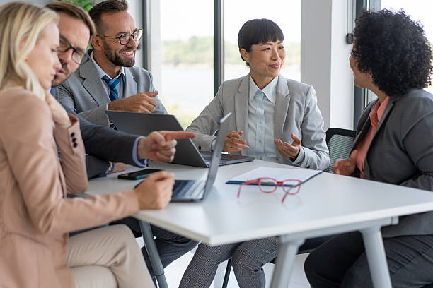 istock Professional Team Engaging in a Collaborative Meeting 2239461142