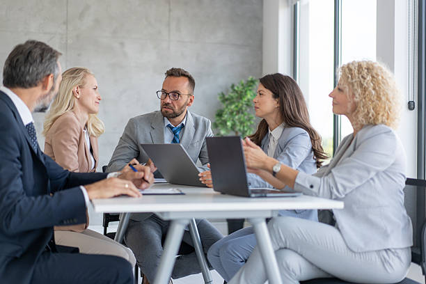 istock Dynamic Interaction Among Team Members in a Meeting Room 2239461148