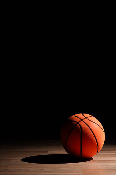 istock Basketball in the Spot Light 2239461967