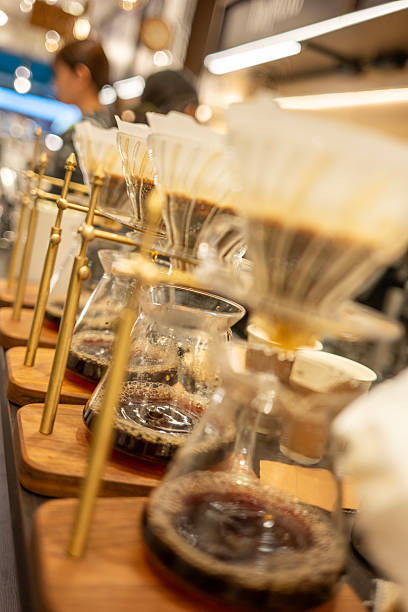 Pour-Over Coffee Brewing In Cafe