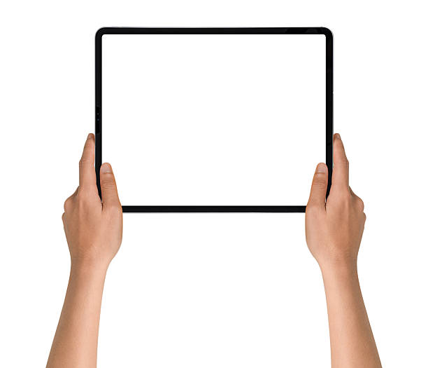 istock Close-up of hands holding modern tablet with blank screen isolated on white background. High quality studio shot. Concept for technology, business, finance, advertising and public relations. 2239473455