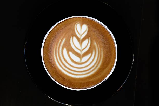 a cup of latte art coffee for background