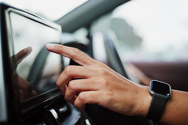 istock Man checking map gps or control music radio in car. 2239477372