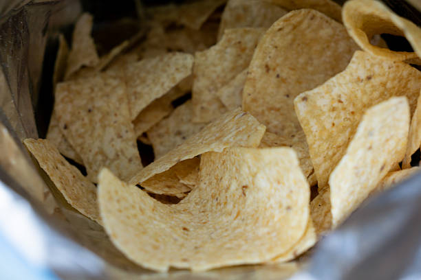 istock A close-up view of tortilla chips inside an opened bag 2239479077